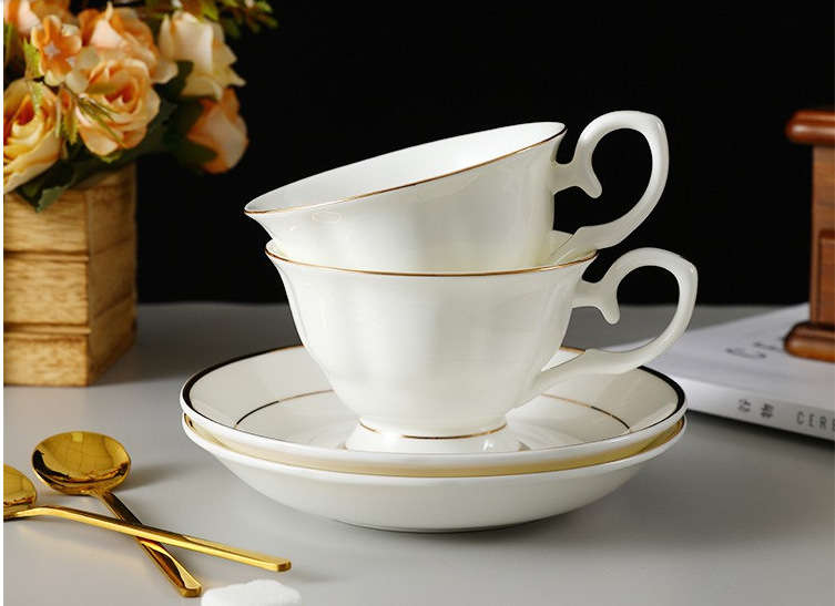 Bone china teacup and saucer - side